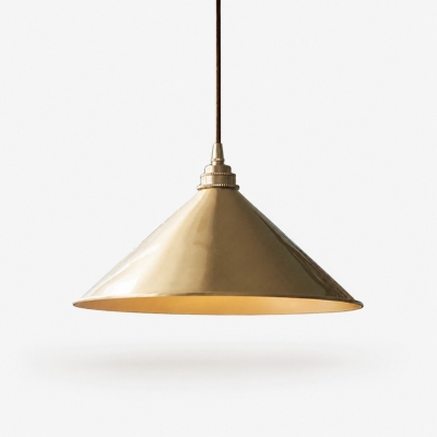 Bell shade copper pendant light on a white background